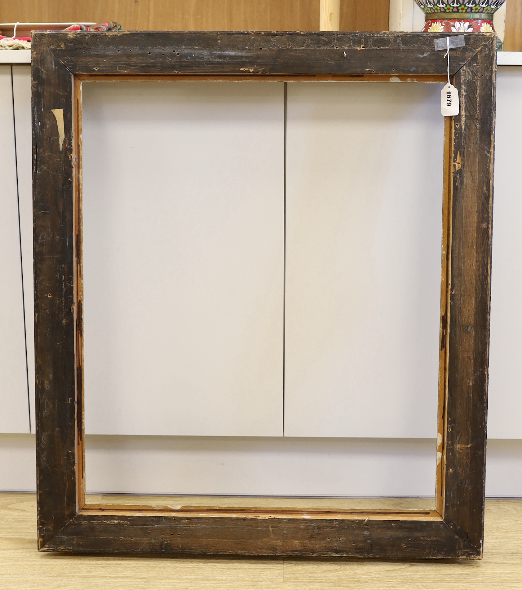 A moulded picture frame, approximately 64cm x 76cm